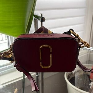 Marc Jacobs Burgundy Leather Crossbody with Gold Hardware and Striped Strap